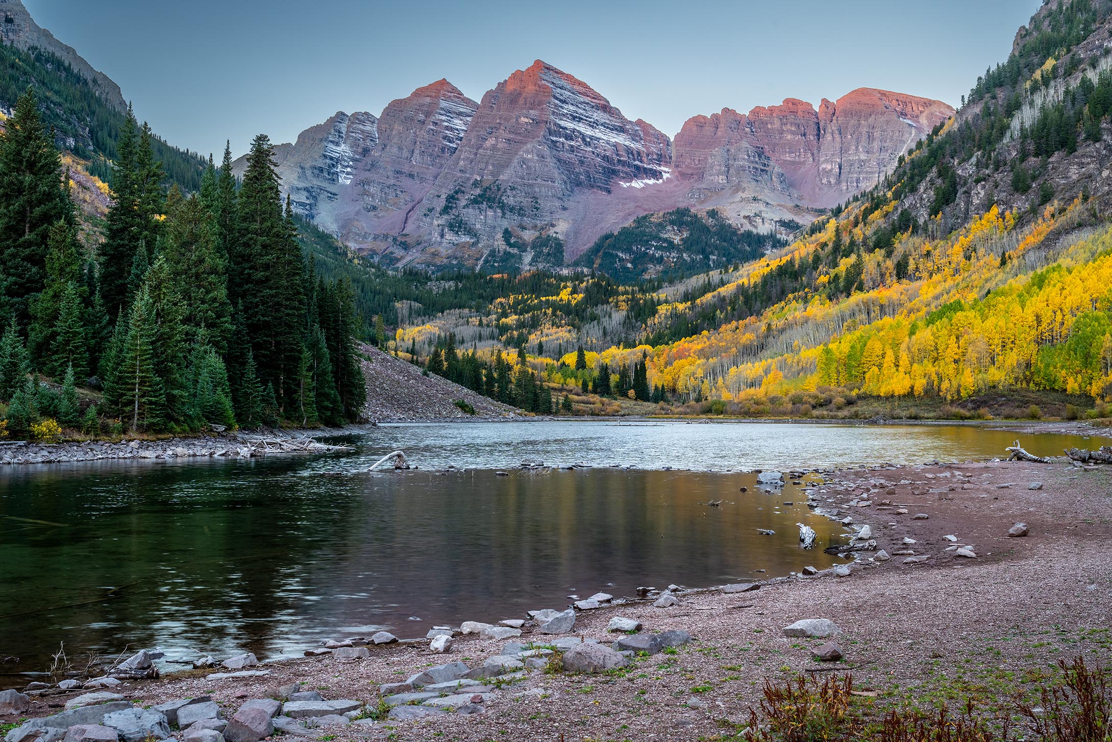 First light at Maroon Bells by John Zhu